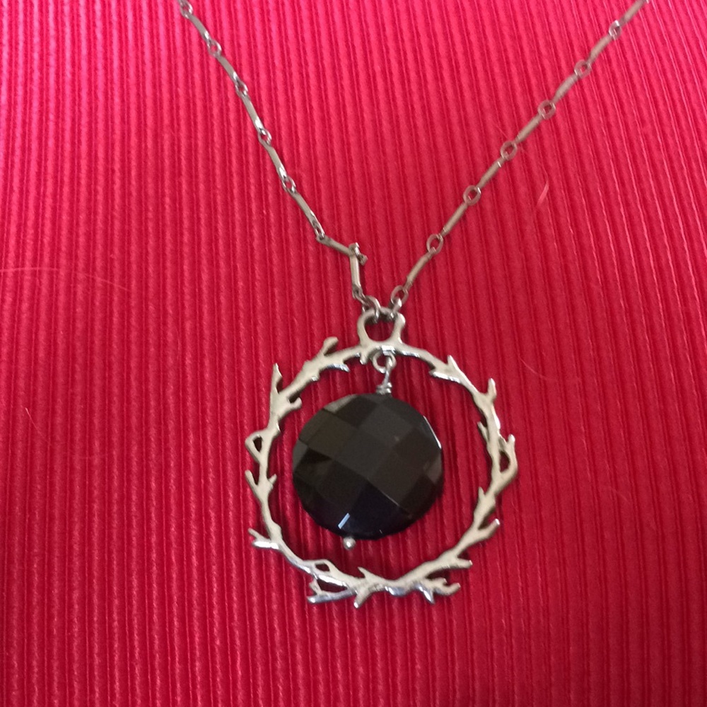 Necklace in silver trim 18” chain black stone